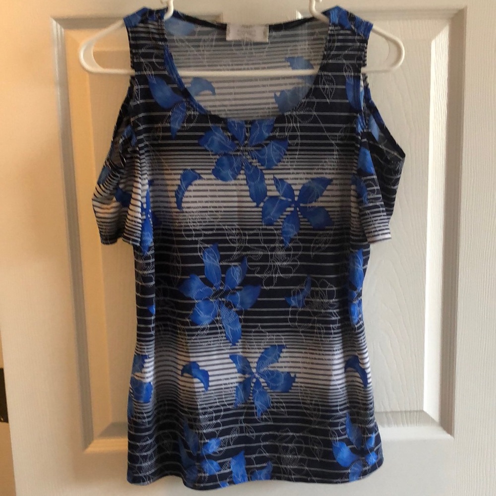 Blue/black stripped shirt with floral pattern.